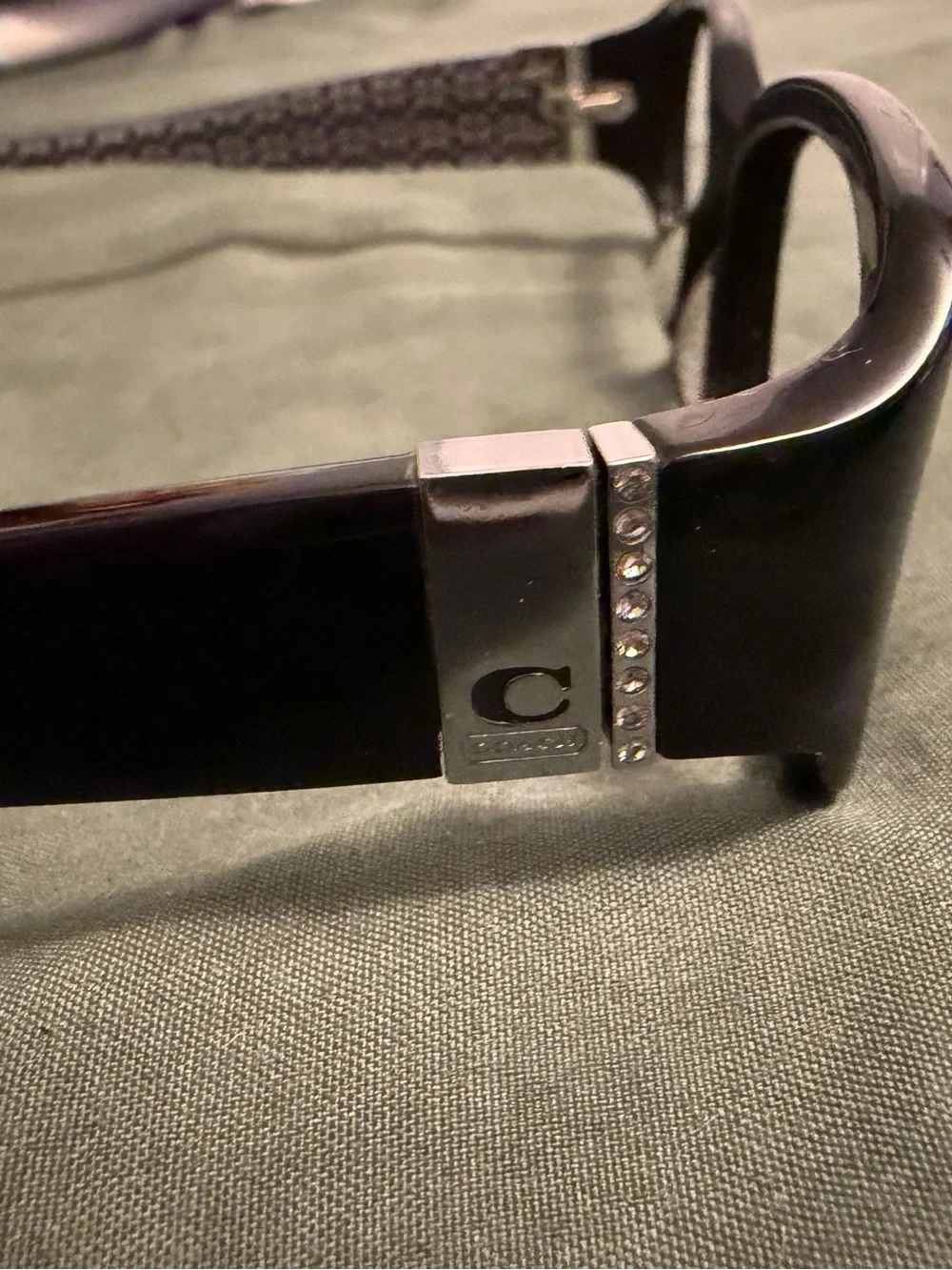 Coach black and silver Vintage frames with diamond temple accents